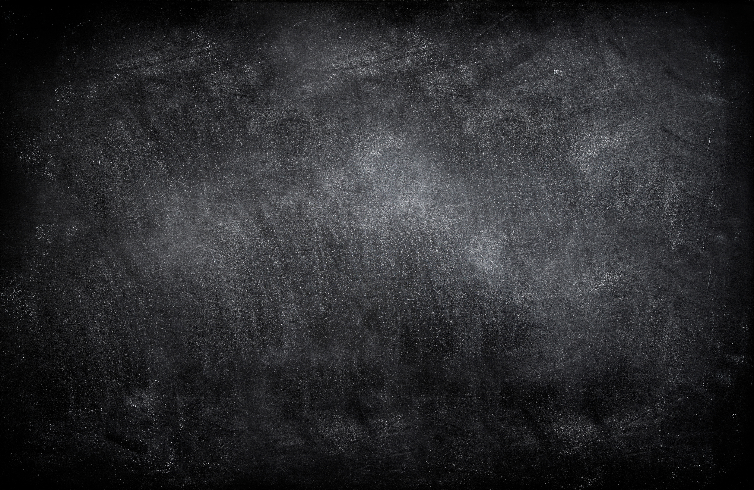 An old dusty black chalk board